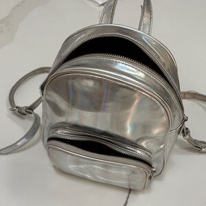 Forever 21 Silver Holographic Mini Backpack